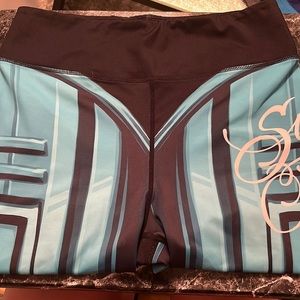 Super fresh brand. Fits great. Hugs nicely. Black and blue. Size XL.